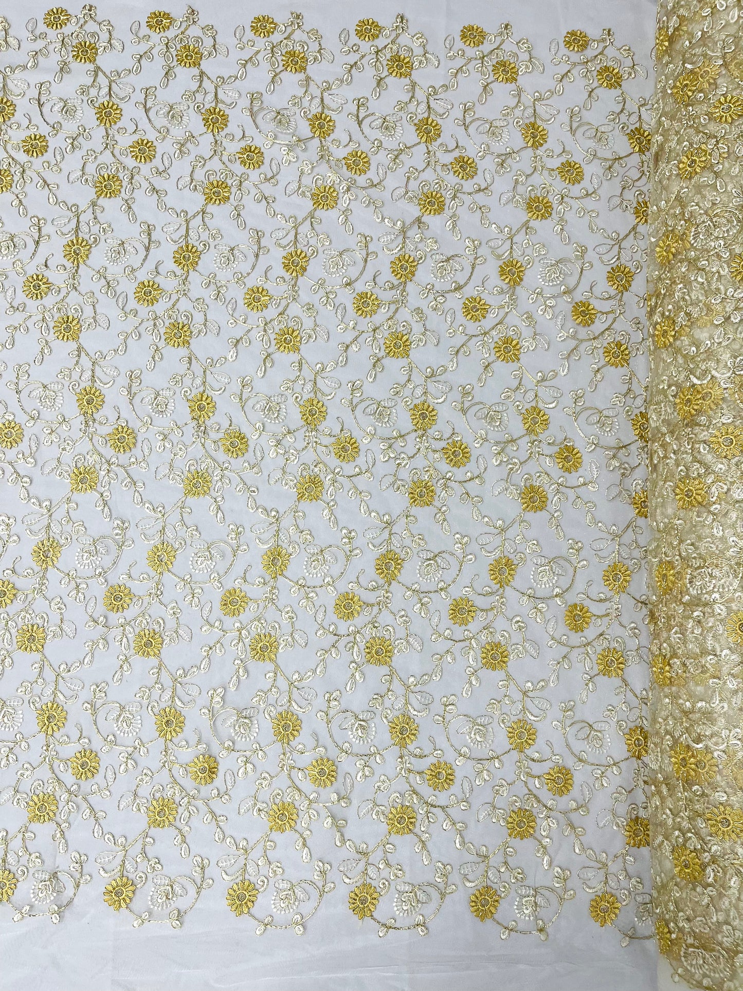 Daisy multi color gold metallic floral design embroider on a red mesh lace-dresses-sold by the yard.