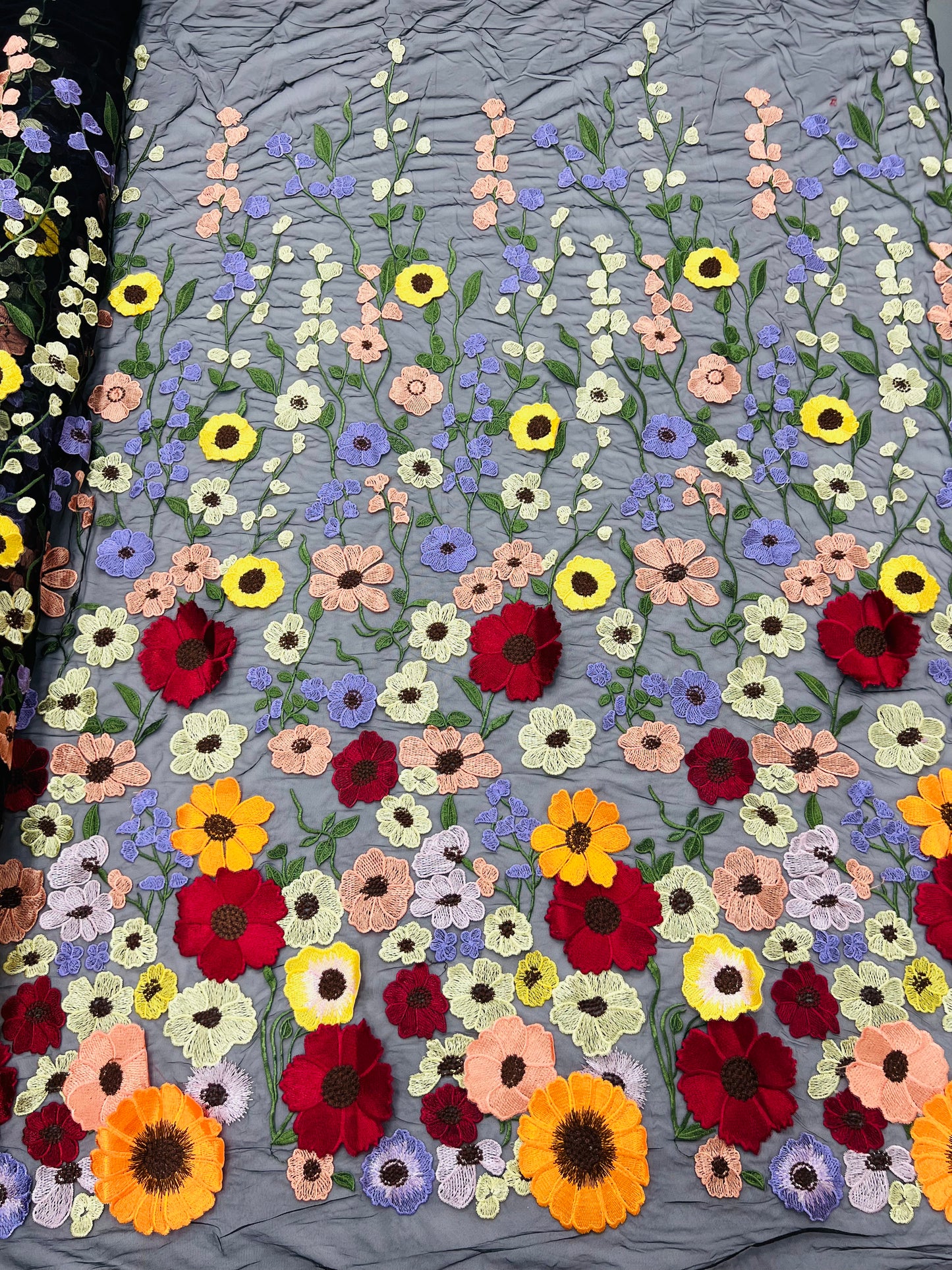 Multi color Sun flower 3d design embroider in a mesh lace-sold by the yard.