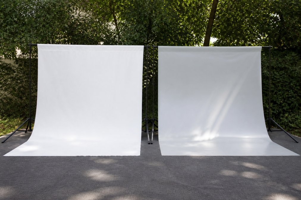 Canvas vs Vinyl for Outdoor Backdrops: 2026 Comparison - New Creations Fabric & Foam Inc