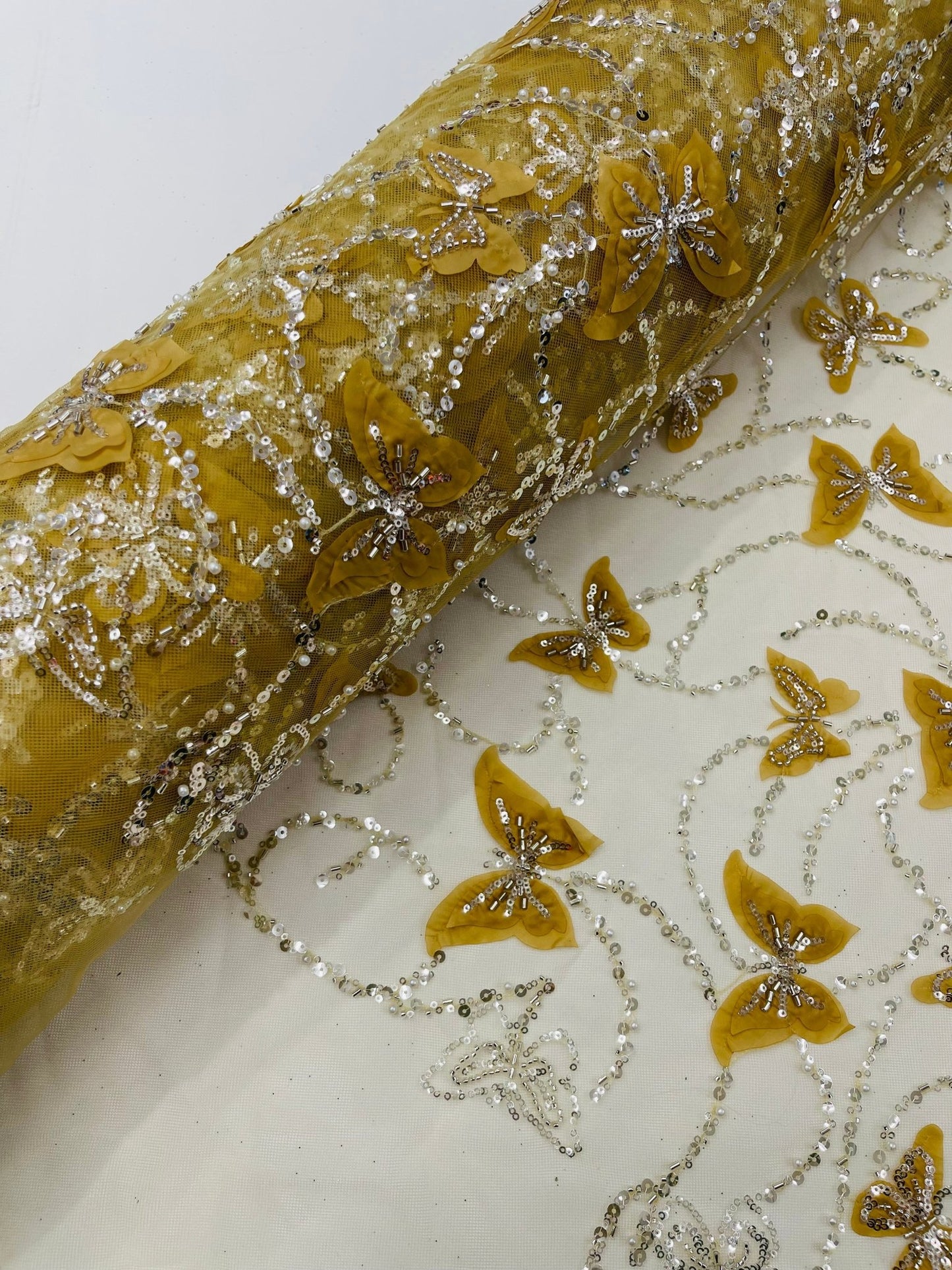 3D Beaded Butterfly Embroidered On A Mesh Fabric| New Creations Fabric & Foam Inc. - New Creations Fabric & Foam Inc