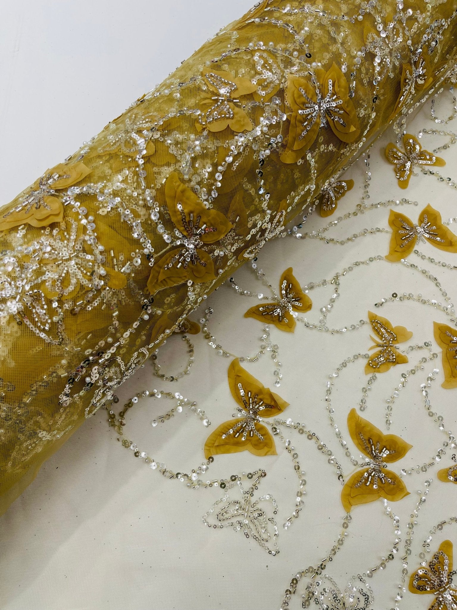 3D Beaded Butterfly Embroidered On A Mesh Fabric| New Creations Fabric & Foam Inc. - New Creations Fabric & Foam Inc