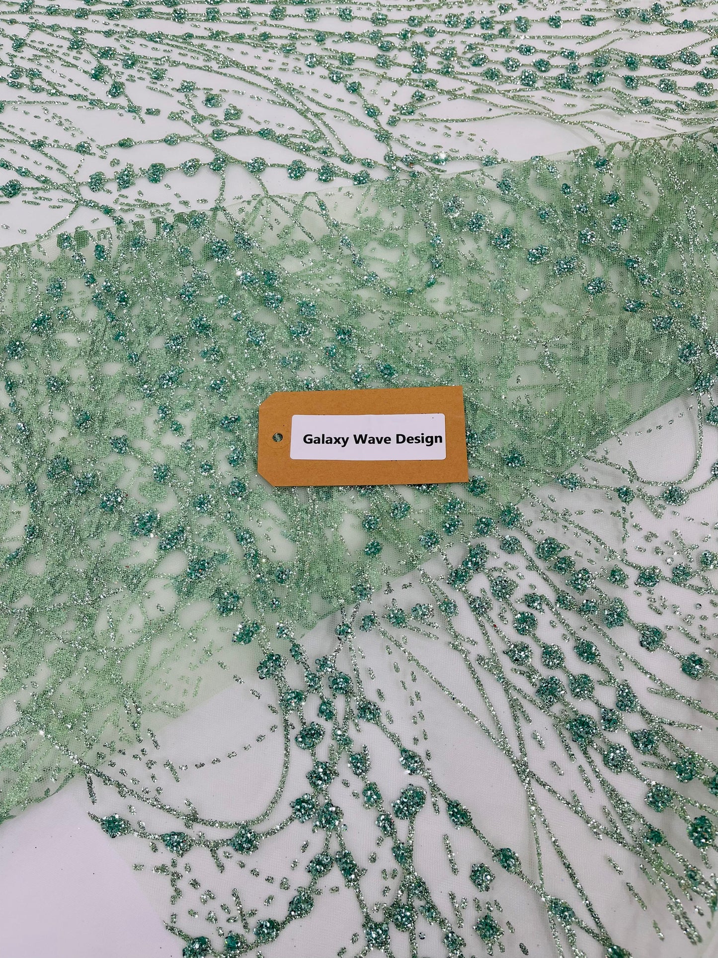 Galaxy Glitter Design On A Mesh Lace 54" Wide| New Creations Fabric & Foam Inc.