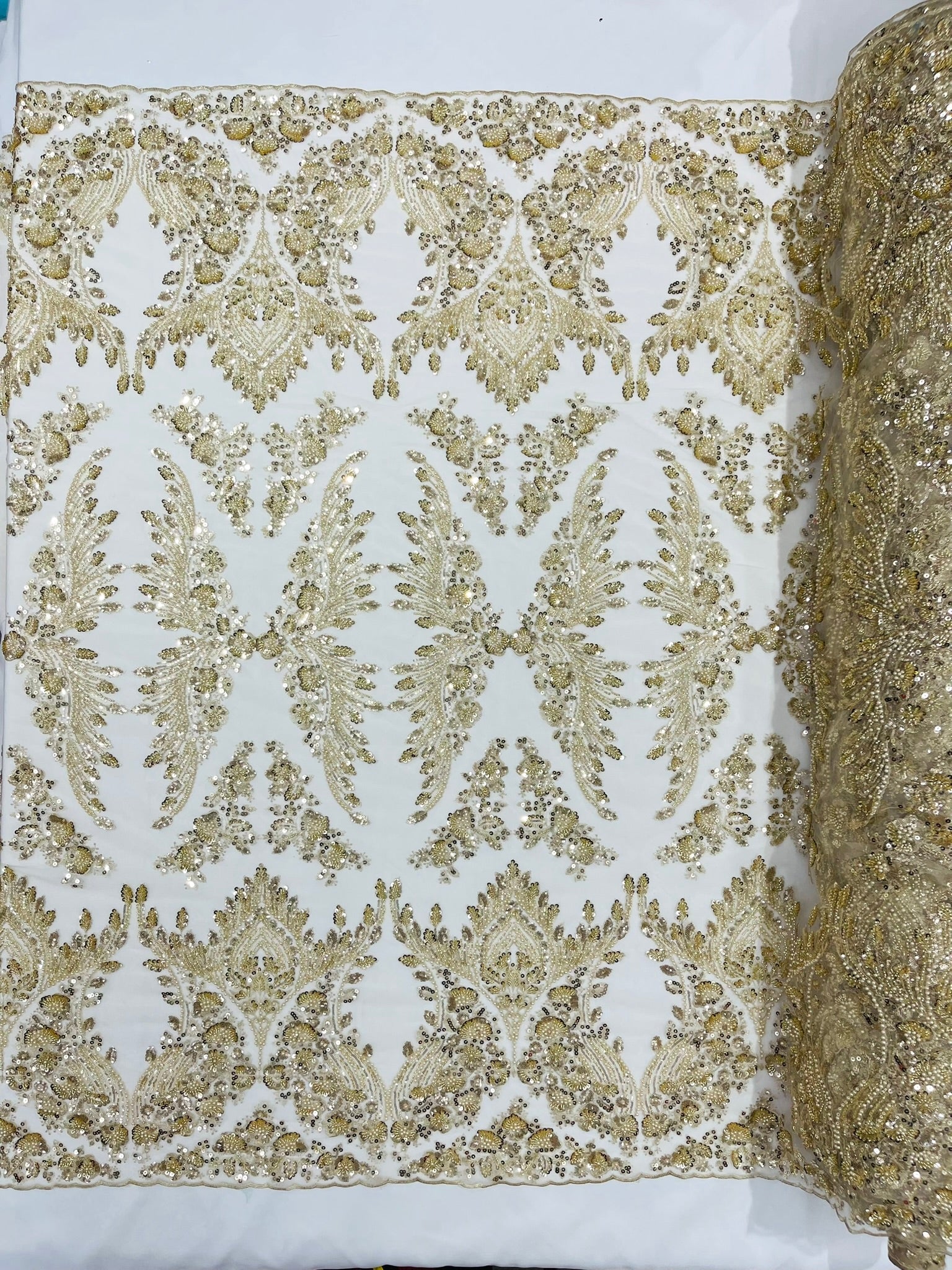 Damask Wing Design Embroidered Heavy Beaded Lace on 54" Mesh Fabric. - New Creations Fabric & Foam Inc