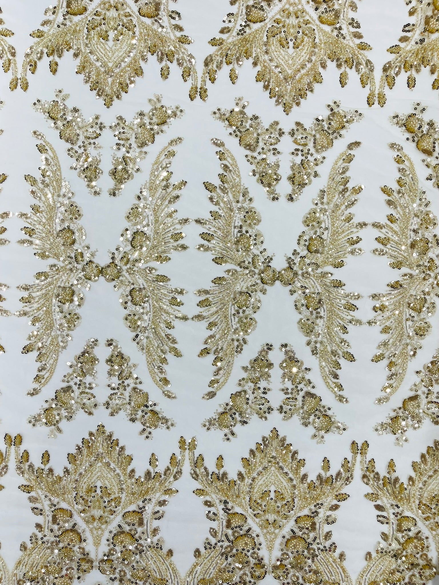 Damask Wing Design Embroidered Heavy Beaded Lace on 54" Mesh Fabric. - New Creations Fabric & Foam Inc