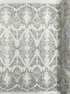 Damask Wing Design Embroidered Heavy Beaded Lace on 54" Mesh Fabric. - New Creations Fabric & Foam Inc