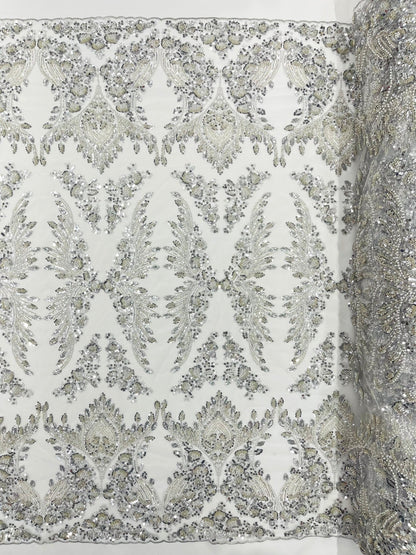 Damask Wing Design Embroidered Heavy Beaded Lace on 54" Mesh Fabric. - New Creations Fabric & Foam Inc