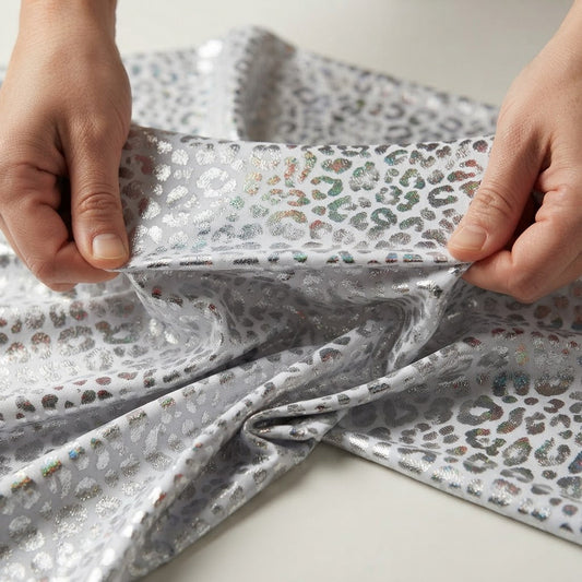 Foil leopard print on a stretch spandex fabric | New Creations Fabric & Foam Inc - New Creations Fabric & Foam Inc