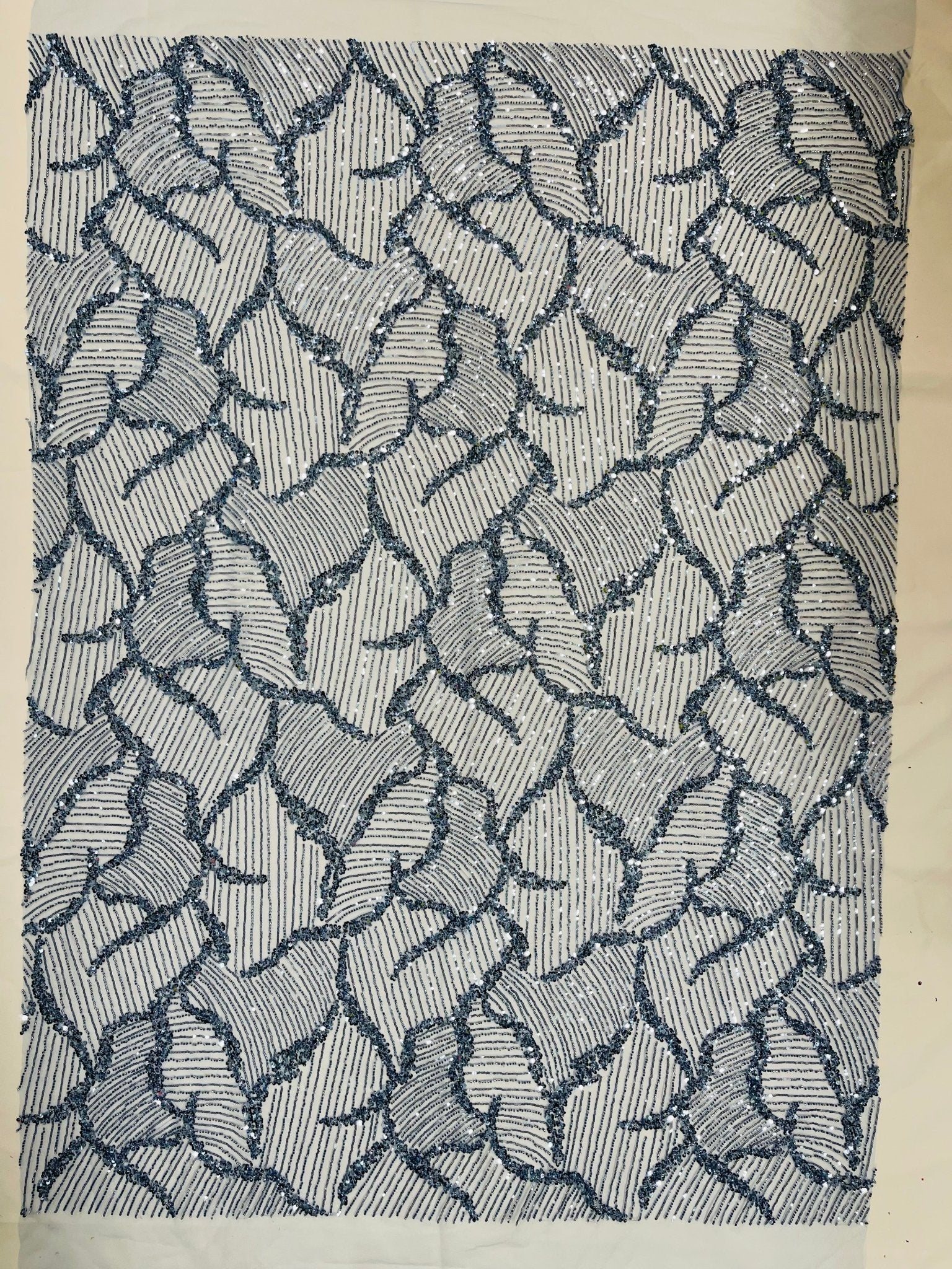 Heavy Beaded Leaf Design on a mesh | New Creation Fabric & Foam - New Creations Fabric & Foam Inc