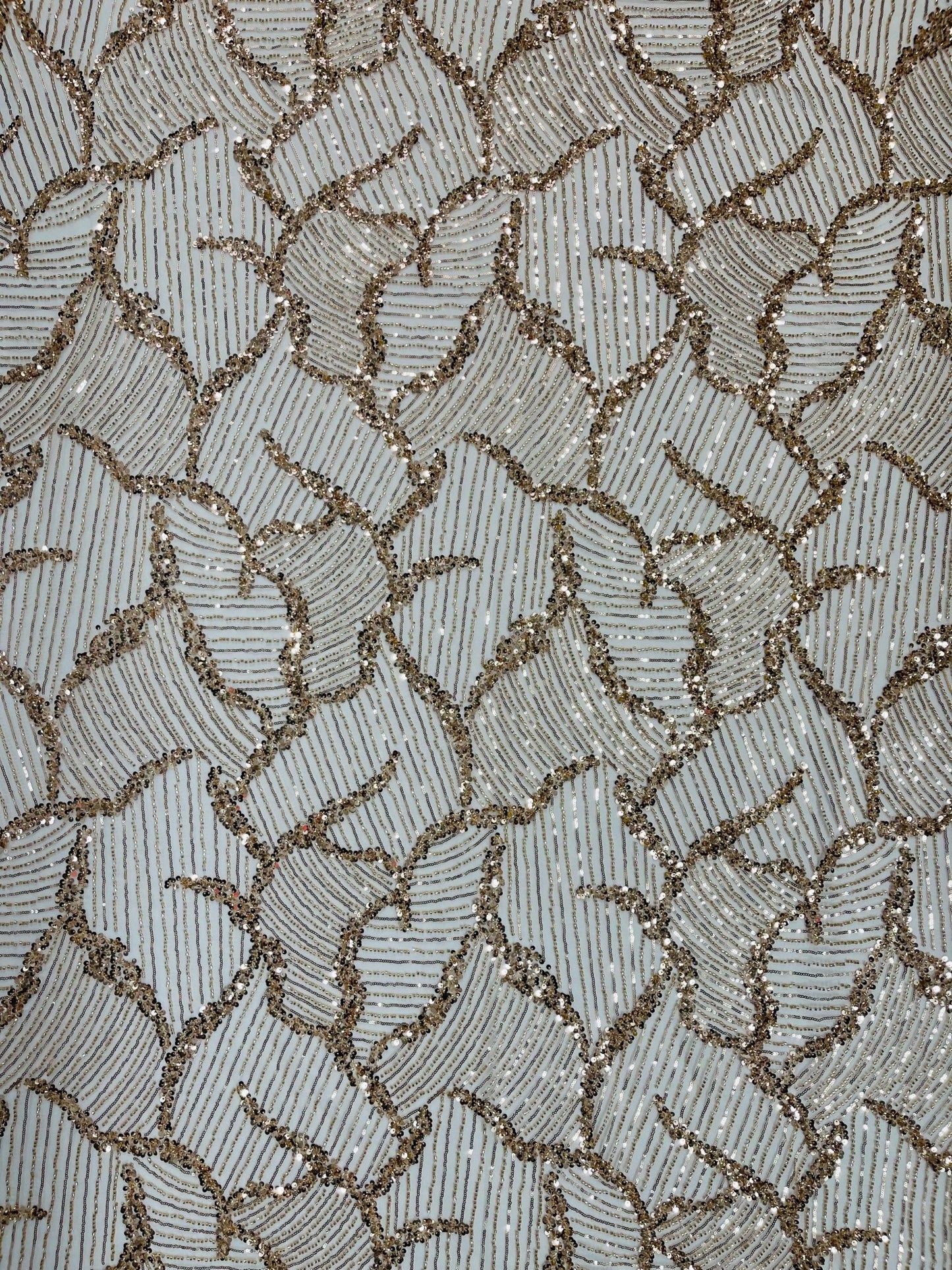 Heavy Beaded Leaf Design on a mesh | New Creation Fabric & Foam - New Creations Fabric & Foam Inc