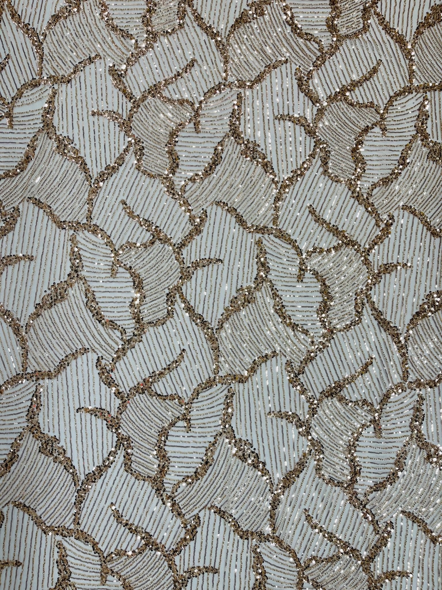 Heavy Beaded Leaf Design on a mesh | New Creation Fabric & Foam - New Creations Fabric & Foam Inc