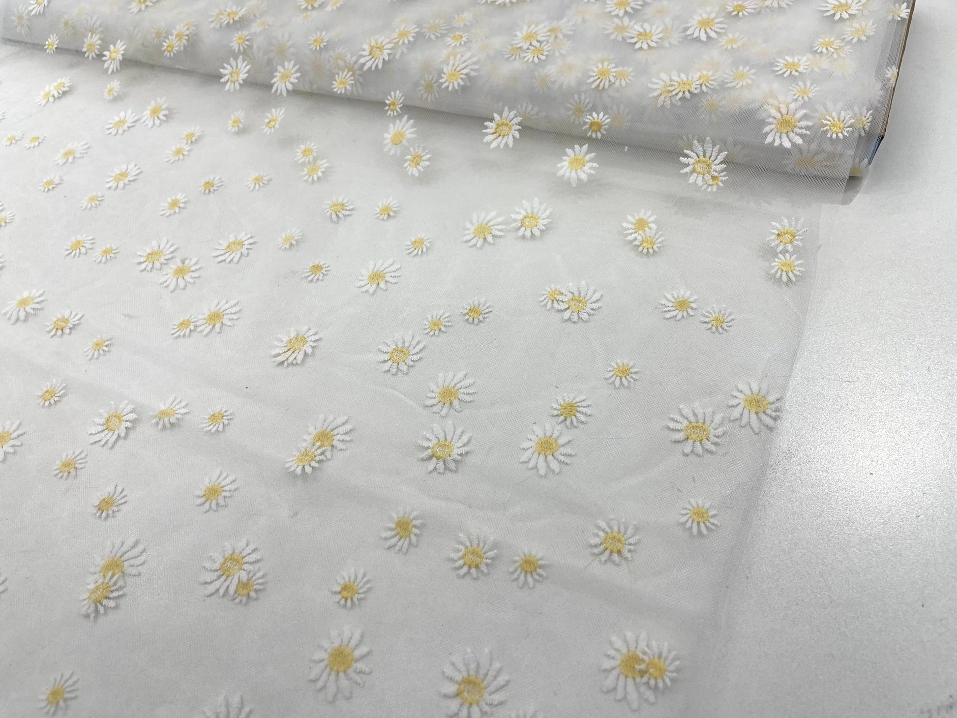 Ivory/Yellow Daisy flowers embroidered lace fabric| New Creations Fabric & Foam Inc. - New Creations Fabric & Foam Inc