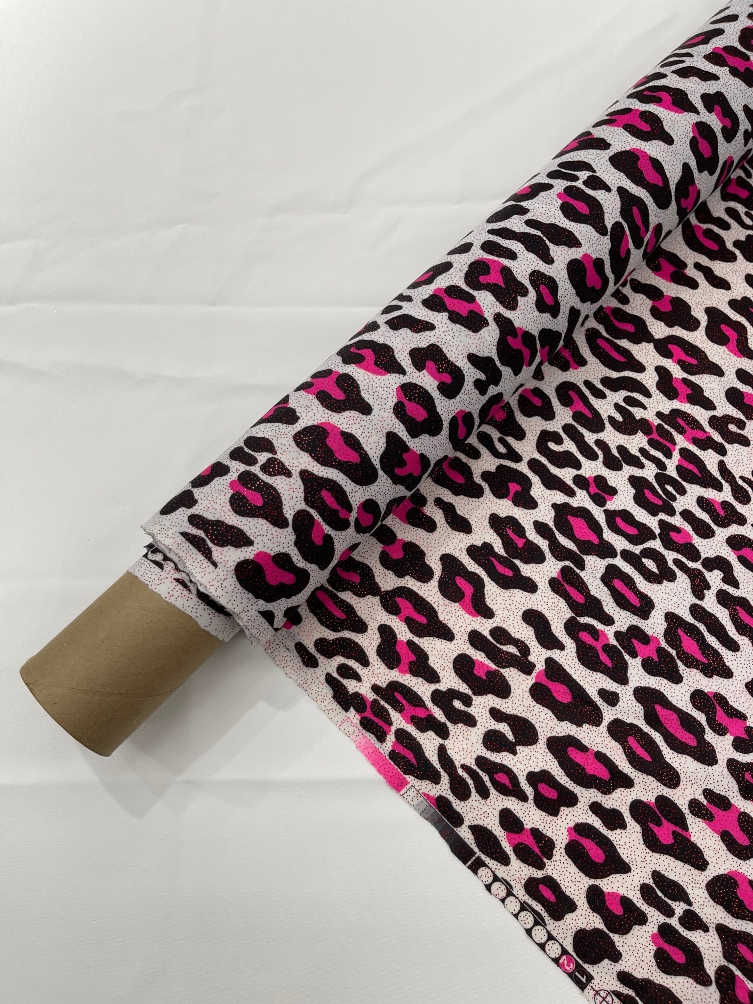 Leopard print with foil stretch spandex fabric | New Creation Fabric & Foam - New Creations Fabric & Foam Inc