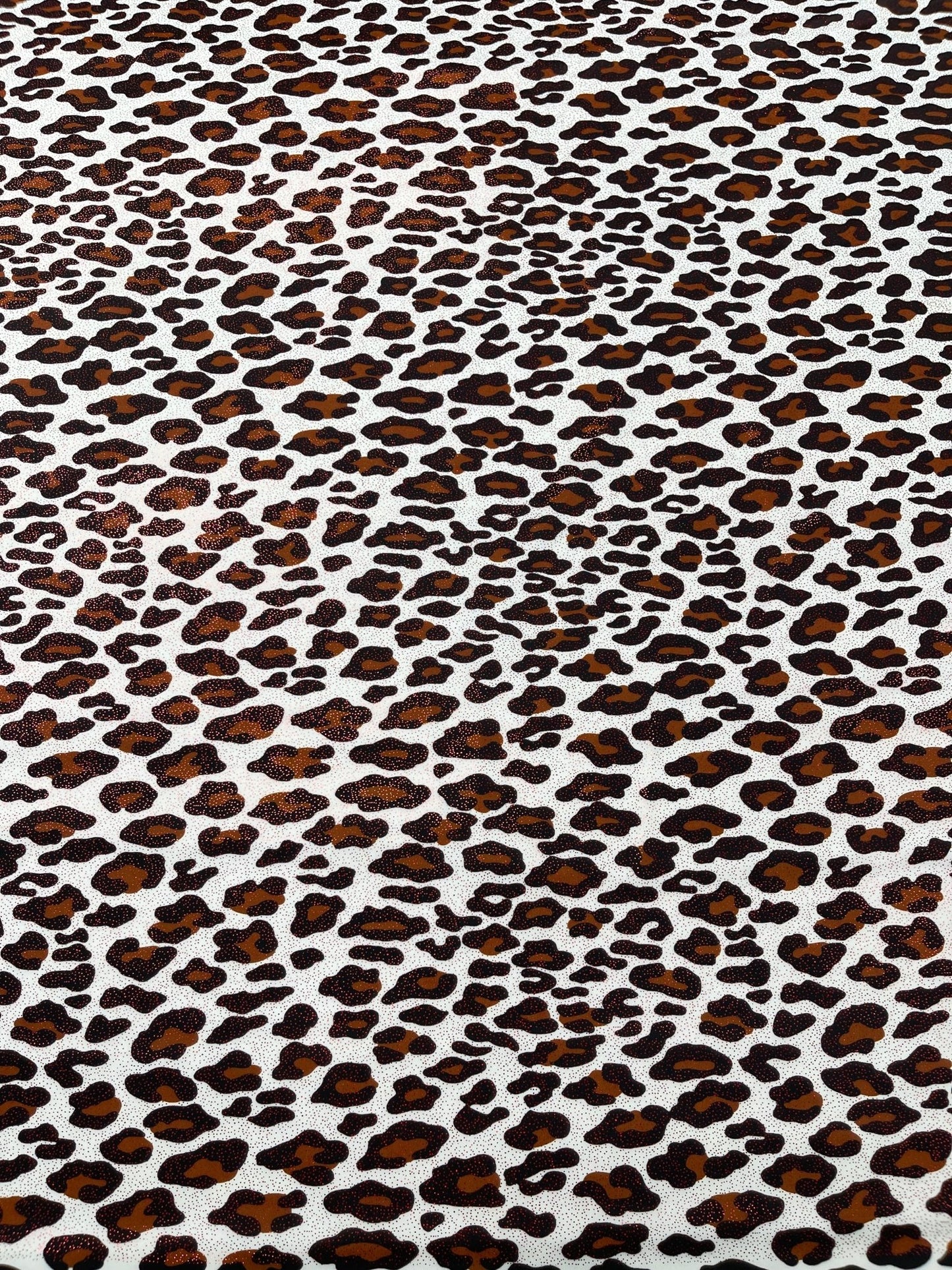 Leopard print with foil stretch spandex fabric | New Creation Fabric & Foam - New Creations Fabric & Foam Inc