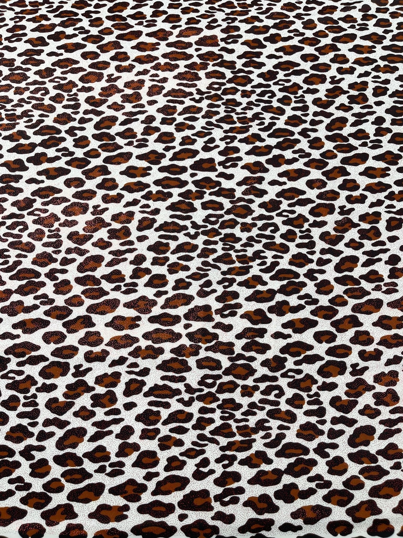Leopard print with foil stretch spandex fabric | New Creation Fabric & Foam - New Creations Fabric & Foam Inc