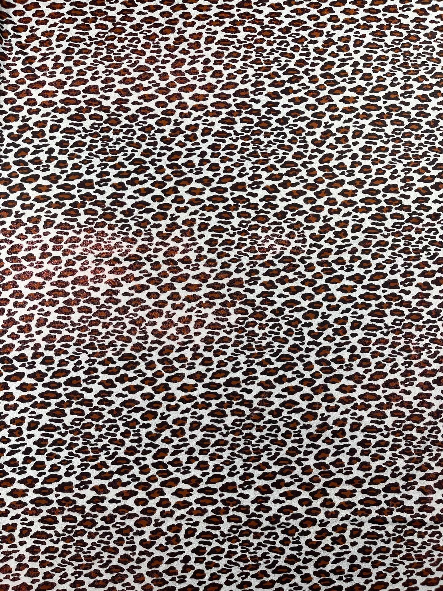 Leopard print with foil stretch spandex fabric | New Creation Fabric & Foam - New Creations Fabric & Foam Inc