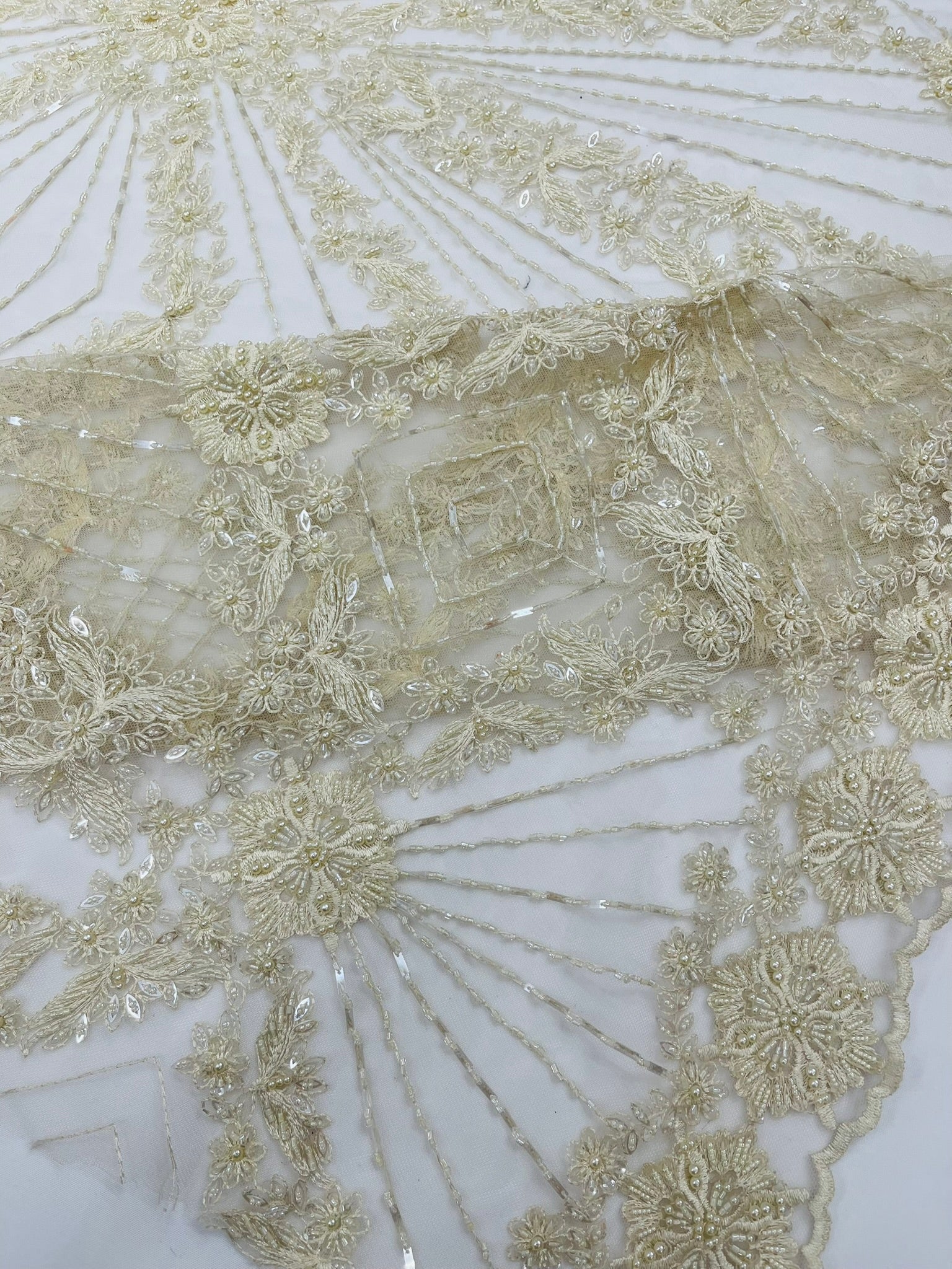Luxury Bridal Fabric with Geometric Beading on a mesh 54” Wide| New Creations Fabric & Foam Inc. - New Creations Fabric & Foam Inc