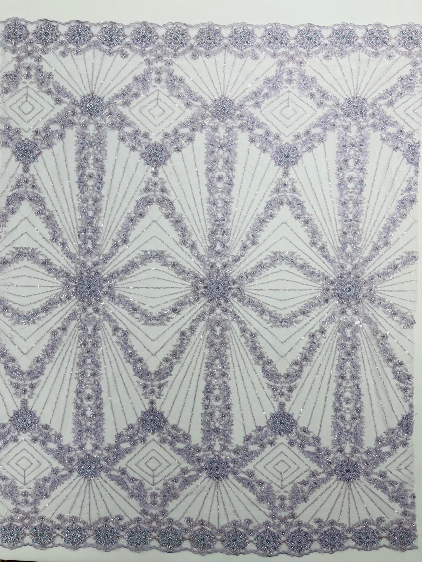 Luxury Bridal Fabric with Geometric Beading on a mesh 54” Wide| New Creations Fabric & Foam Inc. - New Creations Fabric & Foam Inc