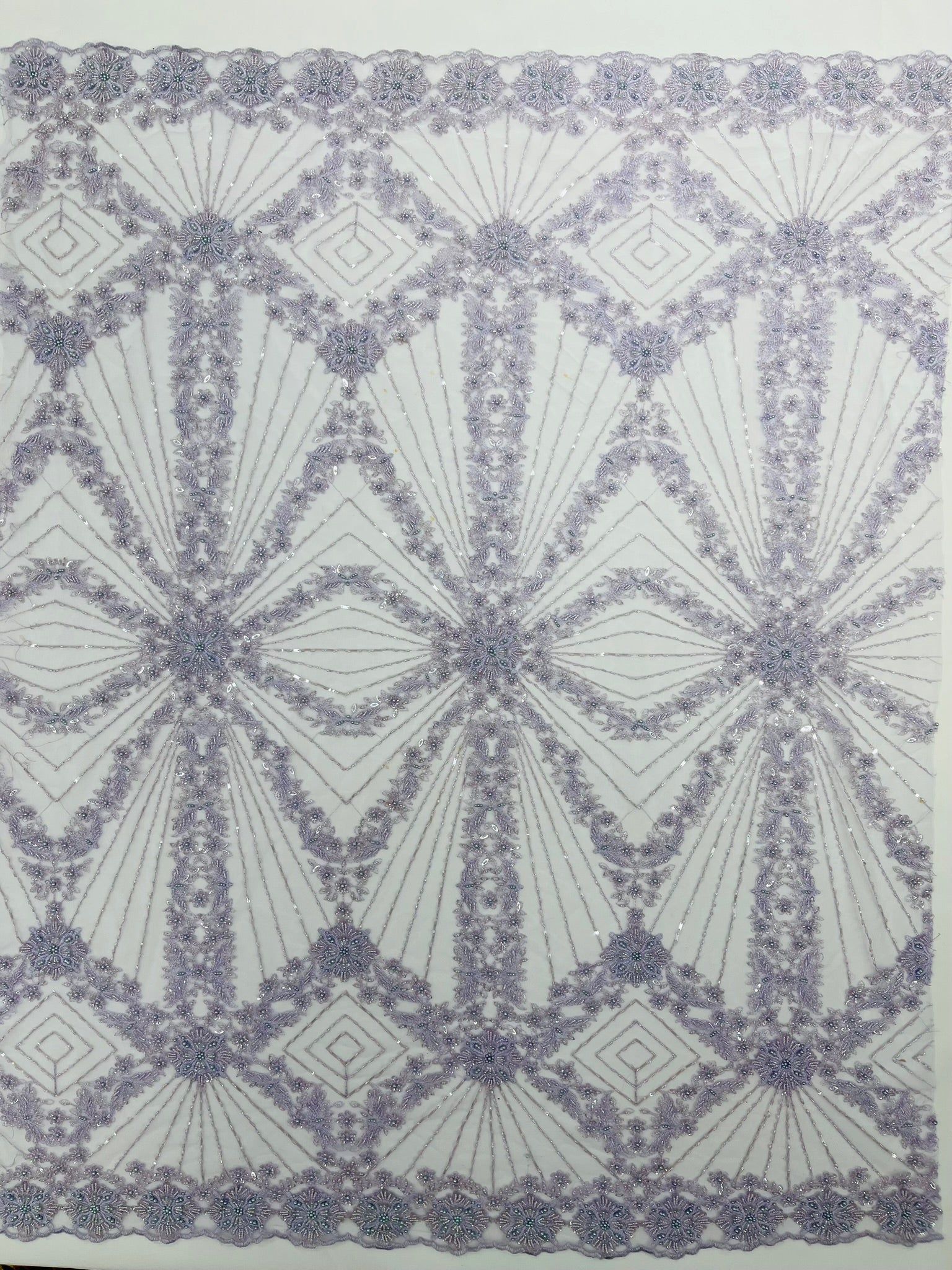 Luxury Bridal Fabric with Geometric Beading on a mesh 54” Wide| New Creations Fabric & Foam Inc. - New Creations Fabric & Foam Inc