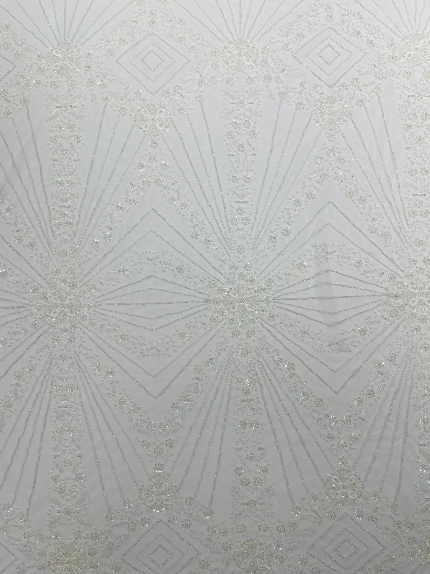 Luxury Bridal Fabric with Geometric Beading on a mesh 54” Wide| New Creations Fabric & Foam Inc. - New Creations Fabric & Foam Inc
