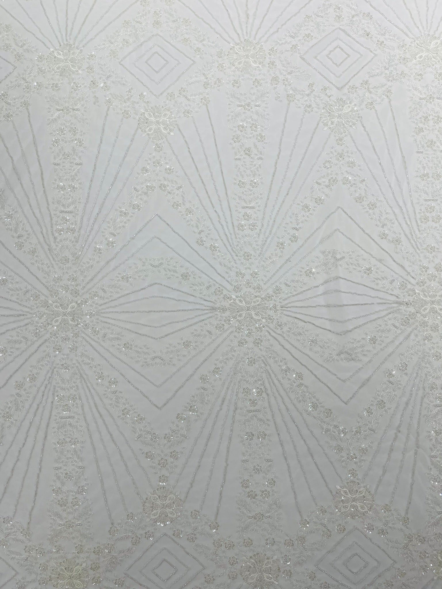 Luxury Bridal Fabric with Geometric Beading on a mesh 54” Wide| New Creations Fabric & Foam Inc. - New Creations Fabric & Foam Inc