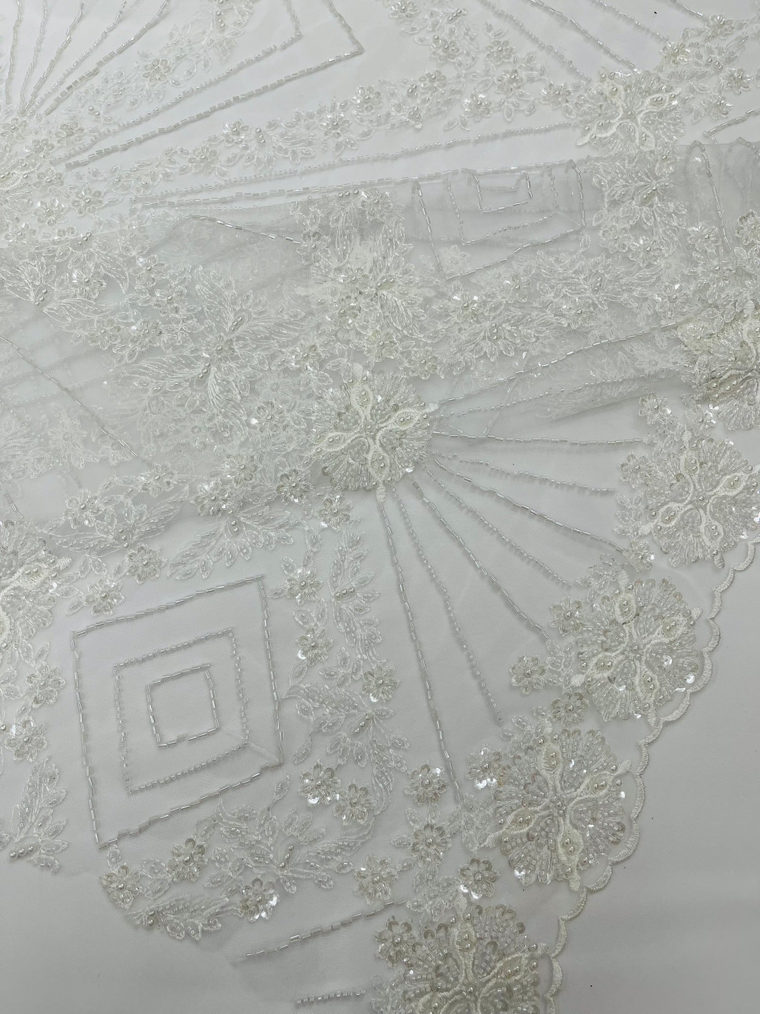 Luxury Bridal Fabric with Geometric Beading on a mesh 54” Wide| New Creations Fabric & Foam Inc. - New Creations Fabric & Foam Inc