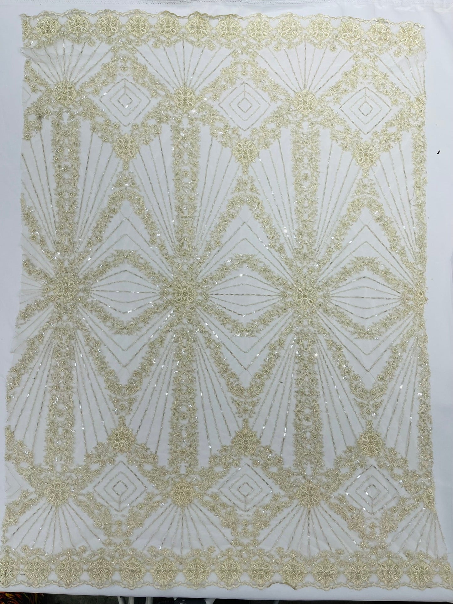 Luxury Bridal Fabric with Geometric Beading on a mesh 54” Wide| New Creations Fabric & Foam Inc. - New Creations Fabric & Foam Inc