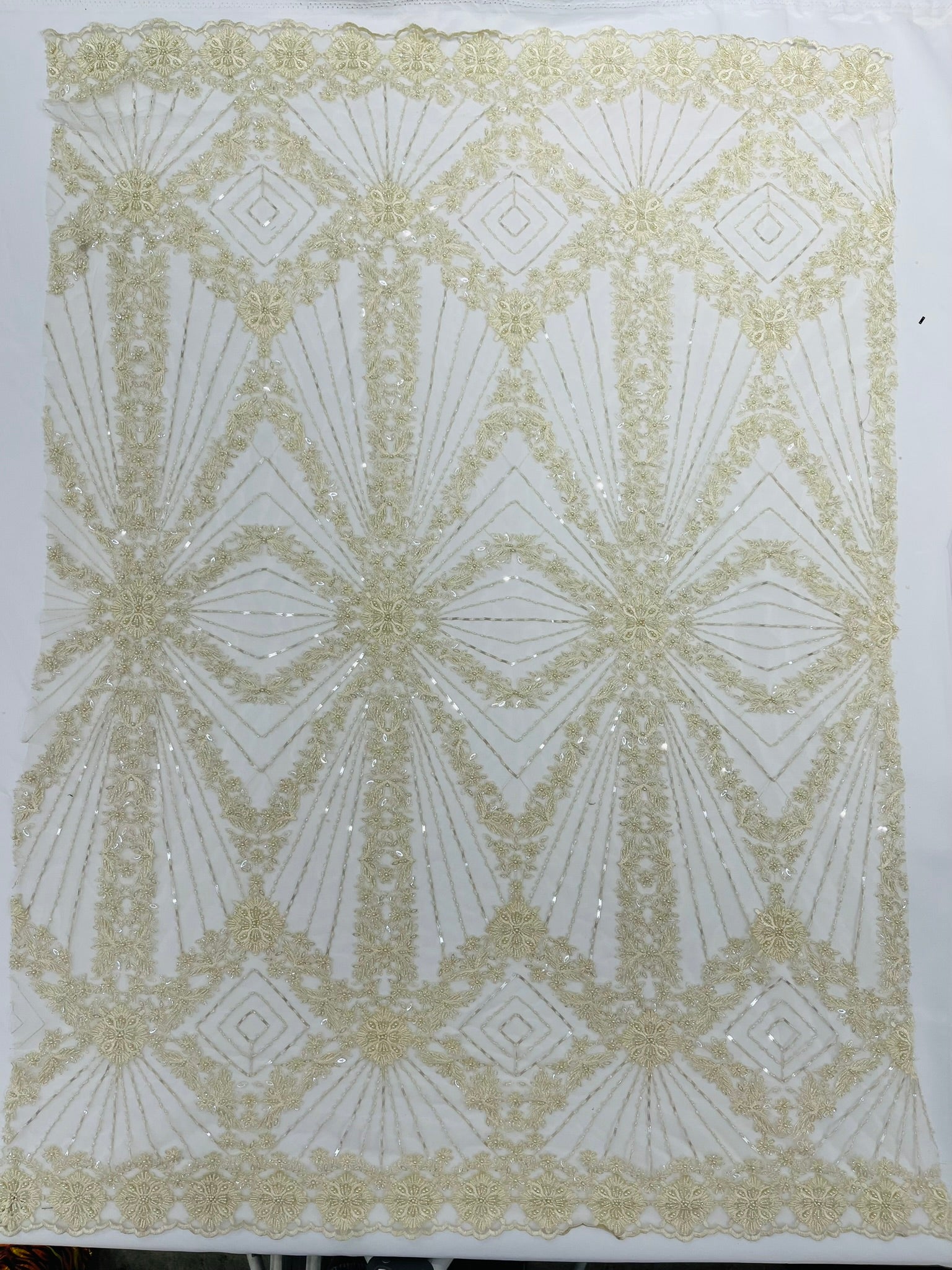 Luxury Bridal Fabric with Geometric Beading on a mesh 54” Wide| New Creations Fabric & Foam Inc. - New Creations Fabric & Foam Inc