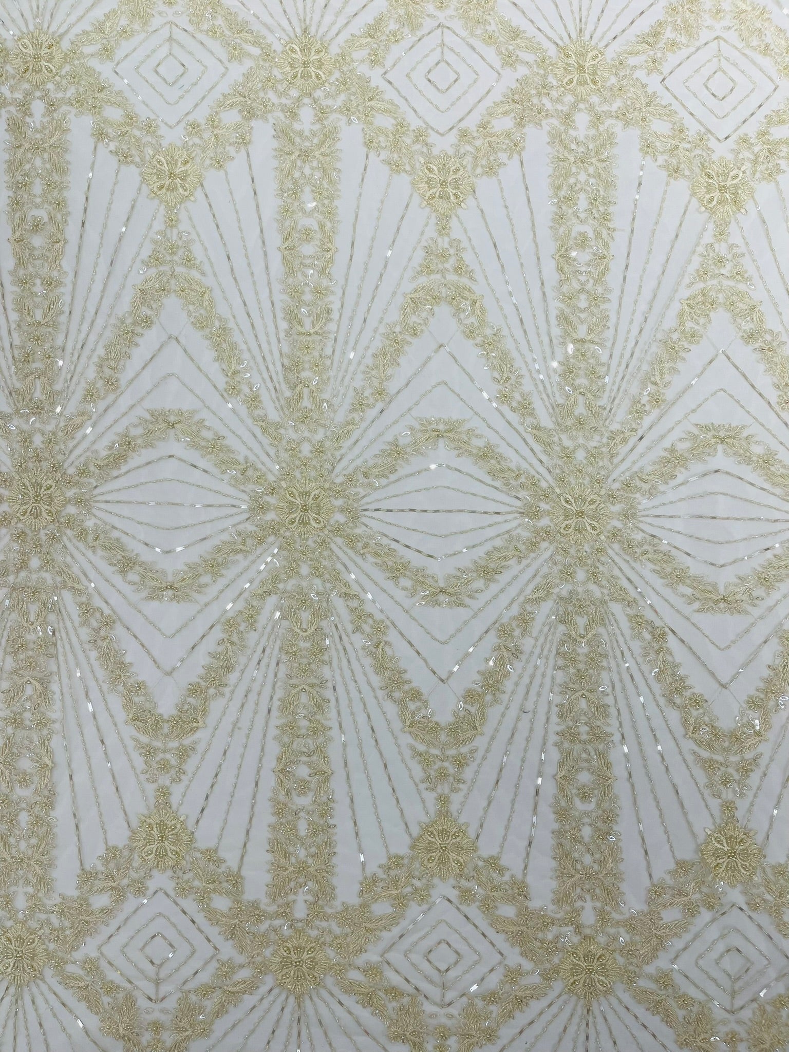 Luxury Bridal Fabric with Geometric Beading on a mesh 54” Wide| New Creations Fabric & Foam Inc. - New Creations Fabric & Foam Inc