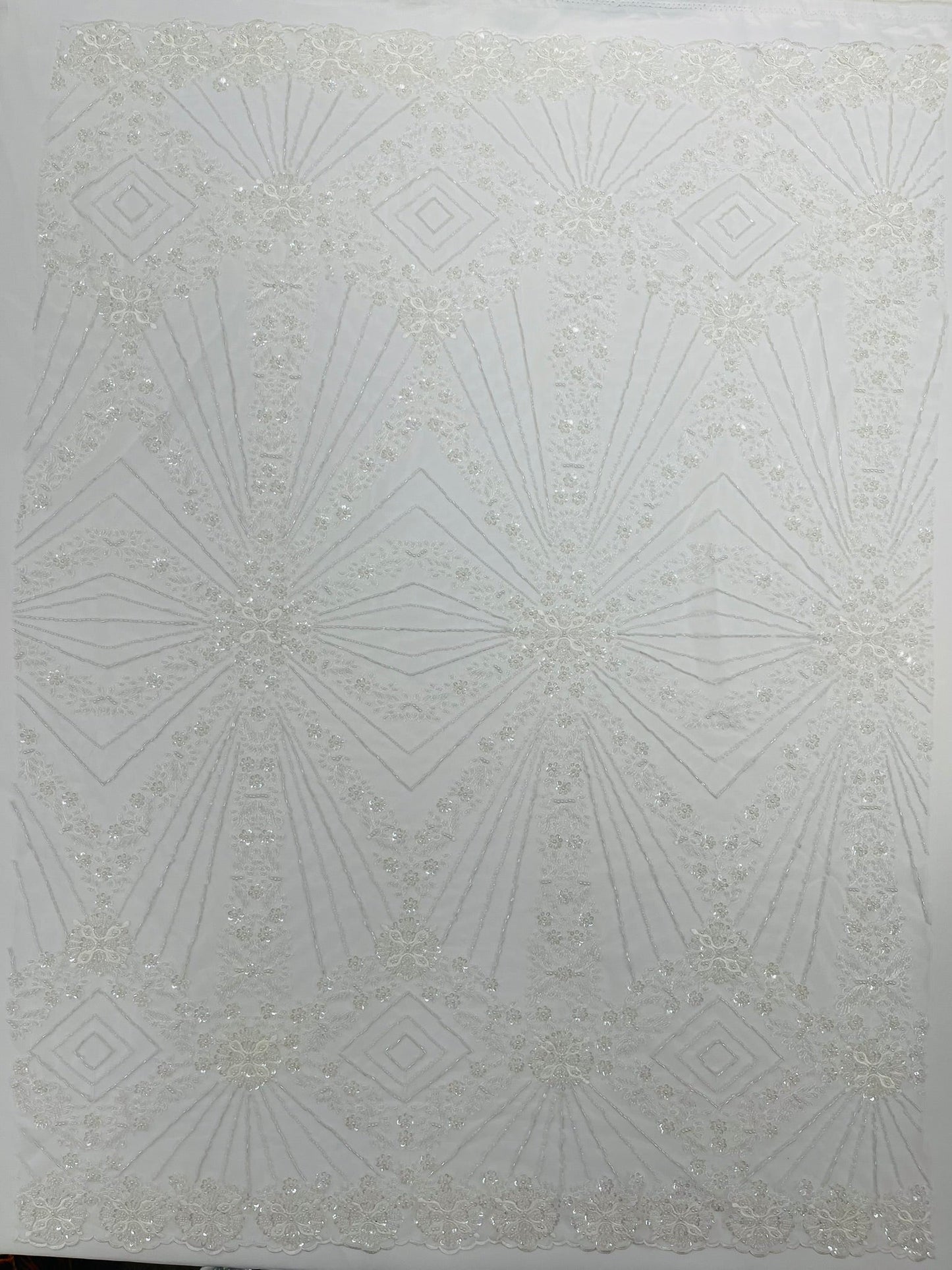 Luxury Bridal Fabric with Geometric Beading on a mesh 54” Wide| New Creations Fabric & Foam Inc. - New Creations Fabric & Foam Inc