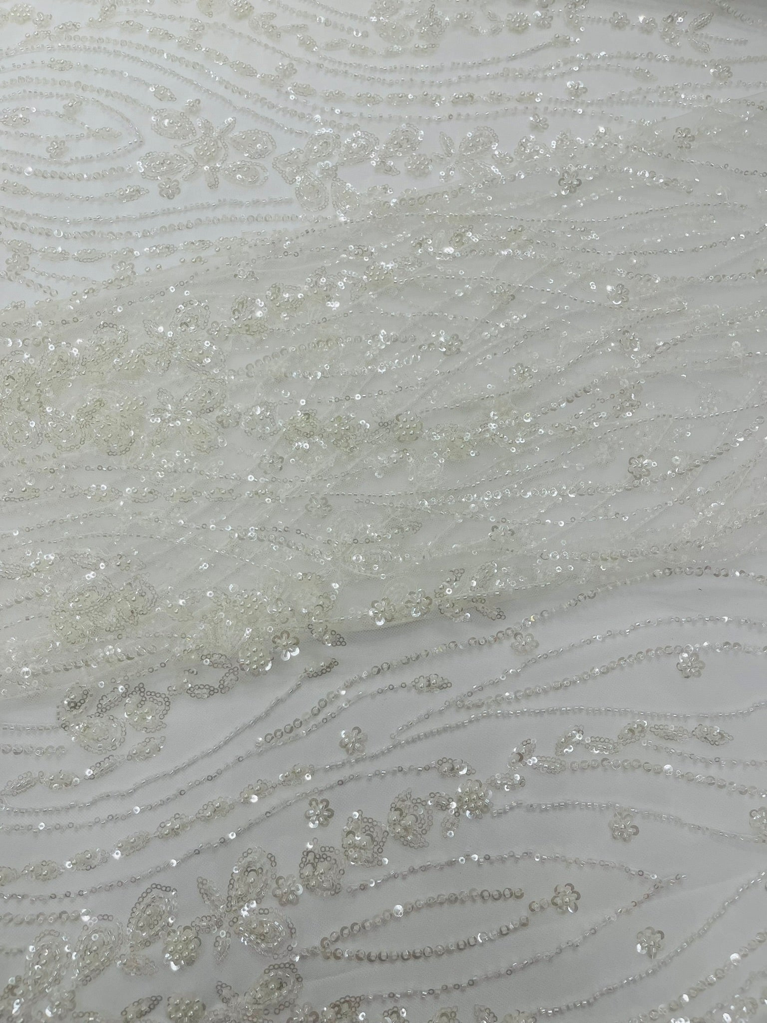 Modern Luxury Beaded Fabric Embroidered on a Mesh Lace 54” Wide| New Creations Fabric & Foam Inc. - New Creations Fabric & Foam Inc