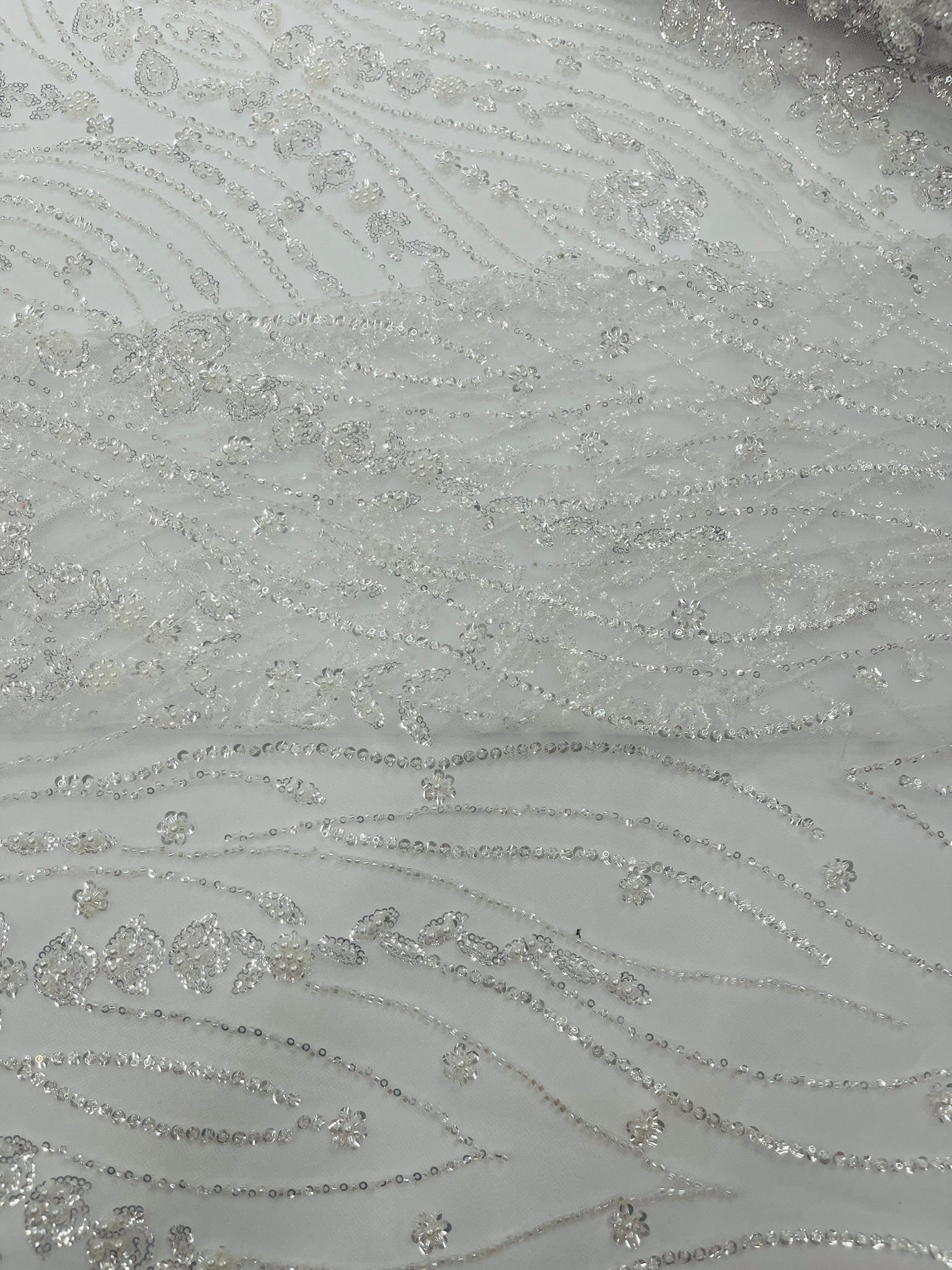 Modern Luxury Beaded Fabric Embroidered on a Mesh Lace 54” Wide| New Creations Fabric & Foam Inc. - New Creations Fabric & Foam Inc