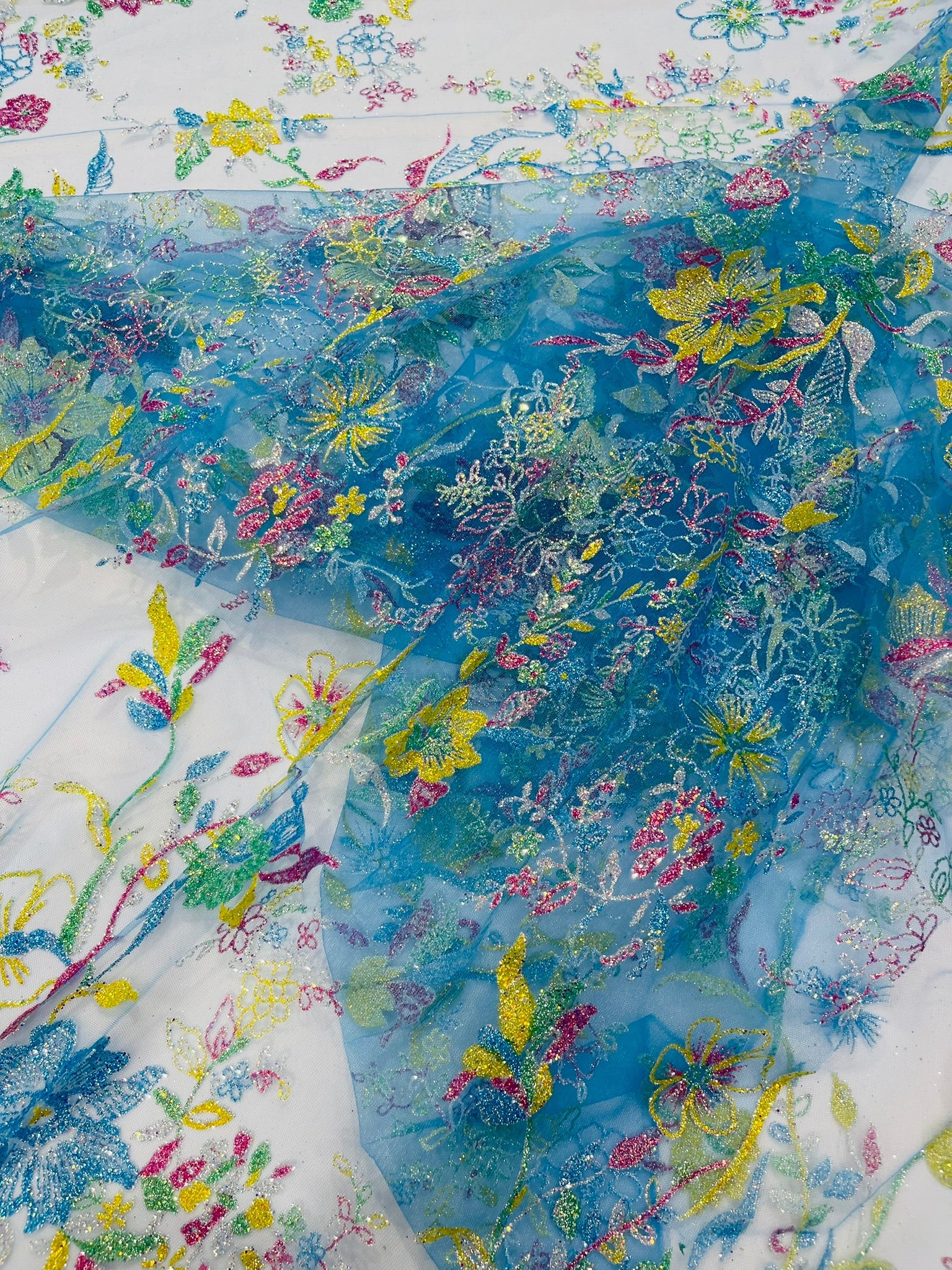 Multi Color Roses Glitter Design On A Mesh Lace Fabric| New Creations Fabric & Foam Inc - New Creations Fabric & Foam Inc