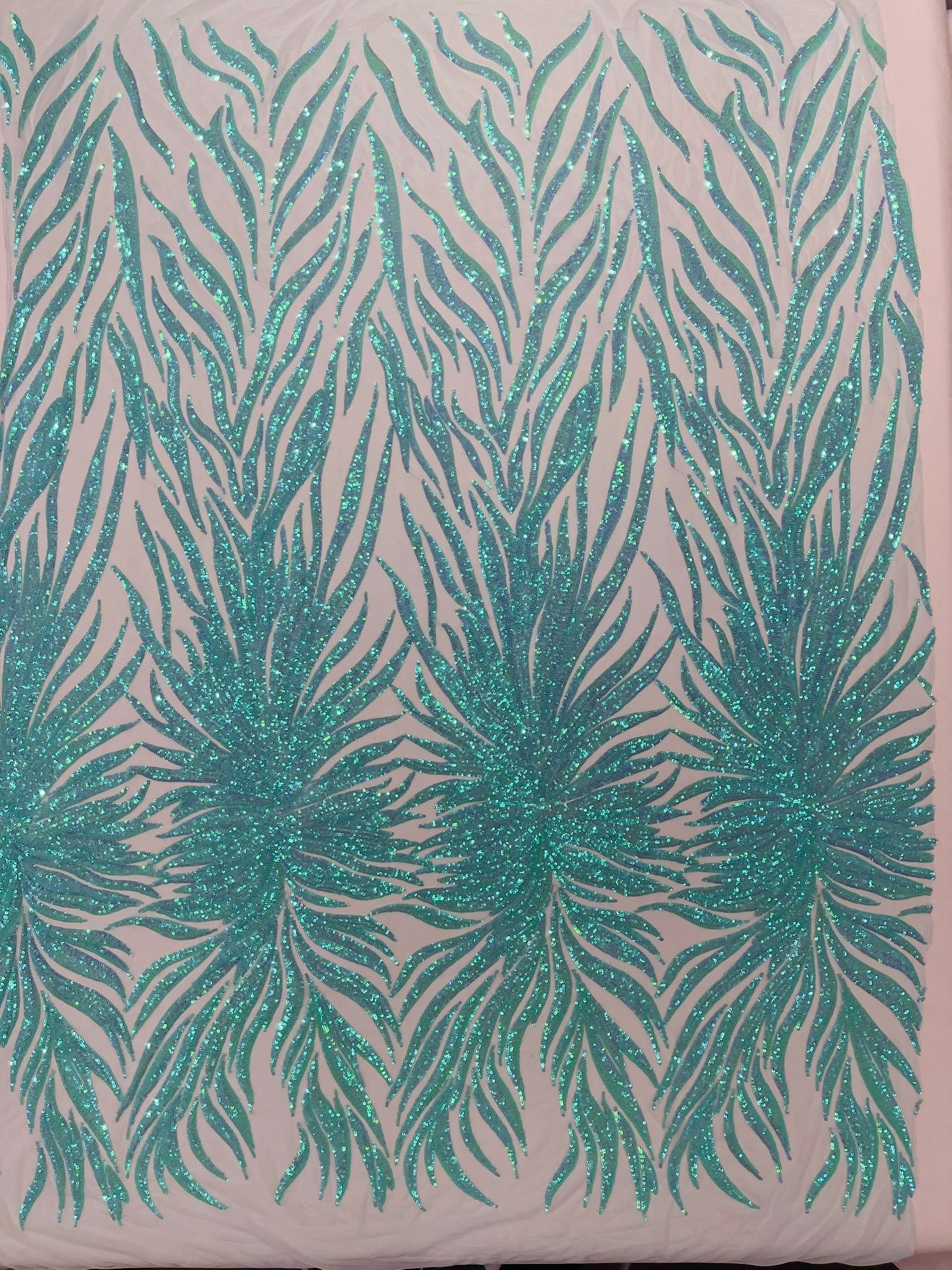 Phoenix Sequin Feather Fabric 54” Wide| New Creations Fabric & Foam Inc. - New Creations Fabric & Foam Inc