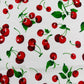 Poly cotton cherry print fabric| New Creations Fabric & Foam Inc. - New Creations Fabric & Foam Inc