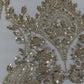 Damask Wing Design Embroidered Heavy Beaded Lace on 54" Mesh Fabric.