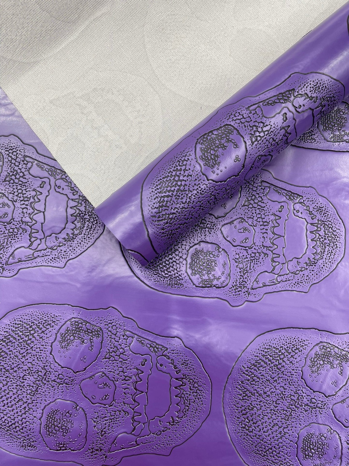 Skull Embossed Fake Leather Upholstery Fabric| New Creations Fabric & Foam Inc. - New Creations Fabric & Foam Inc