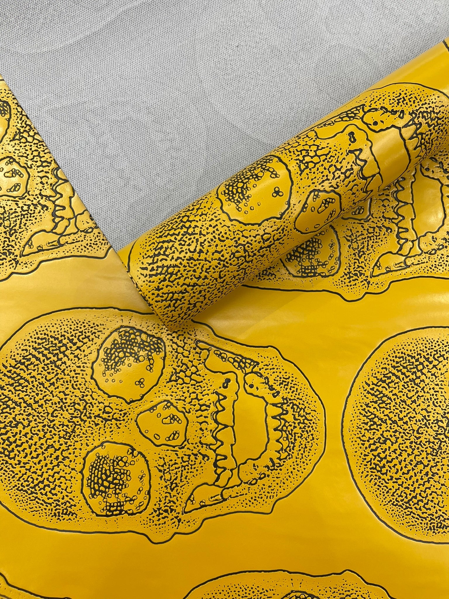 Skull Embossed Fake Leather Upholstery Fabric| New Creations Fabric & Foam Inc. - New Creations Fabric & Foam Inc