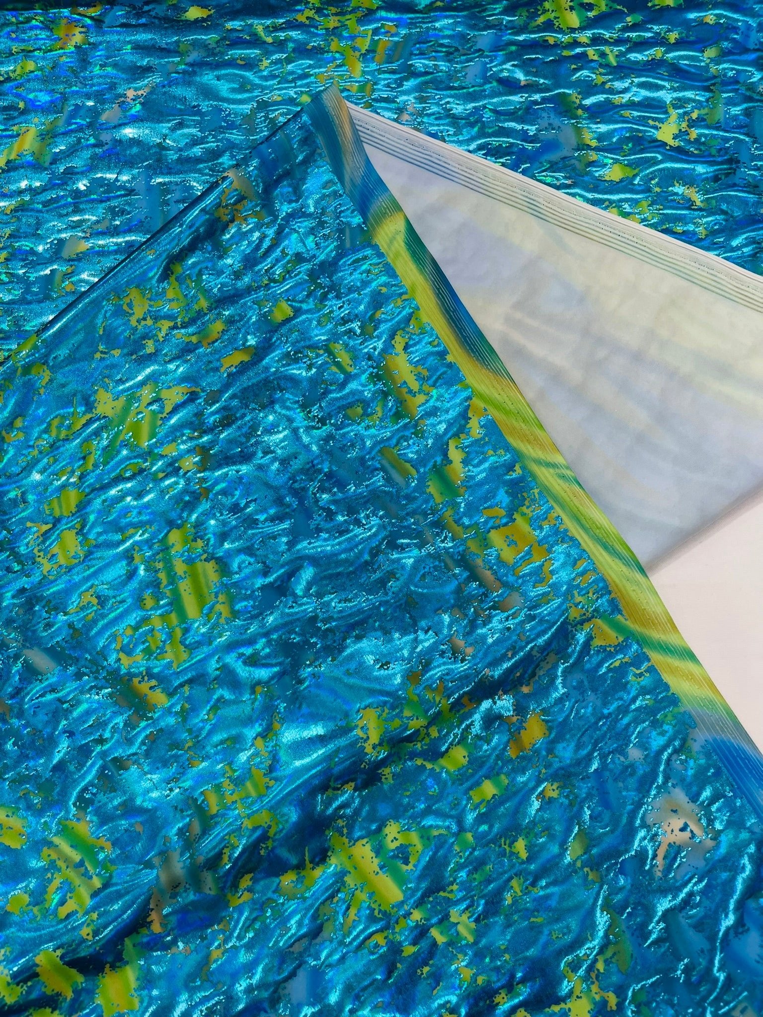 Splatter Foil Paint Metallic Print on a 4 - way Stretch Tie Dye Nylon Spandex | New Creations Fabric & Foam Inc. - New Creations Fabric & Foam Inc