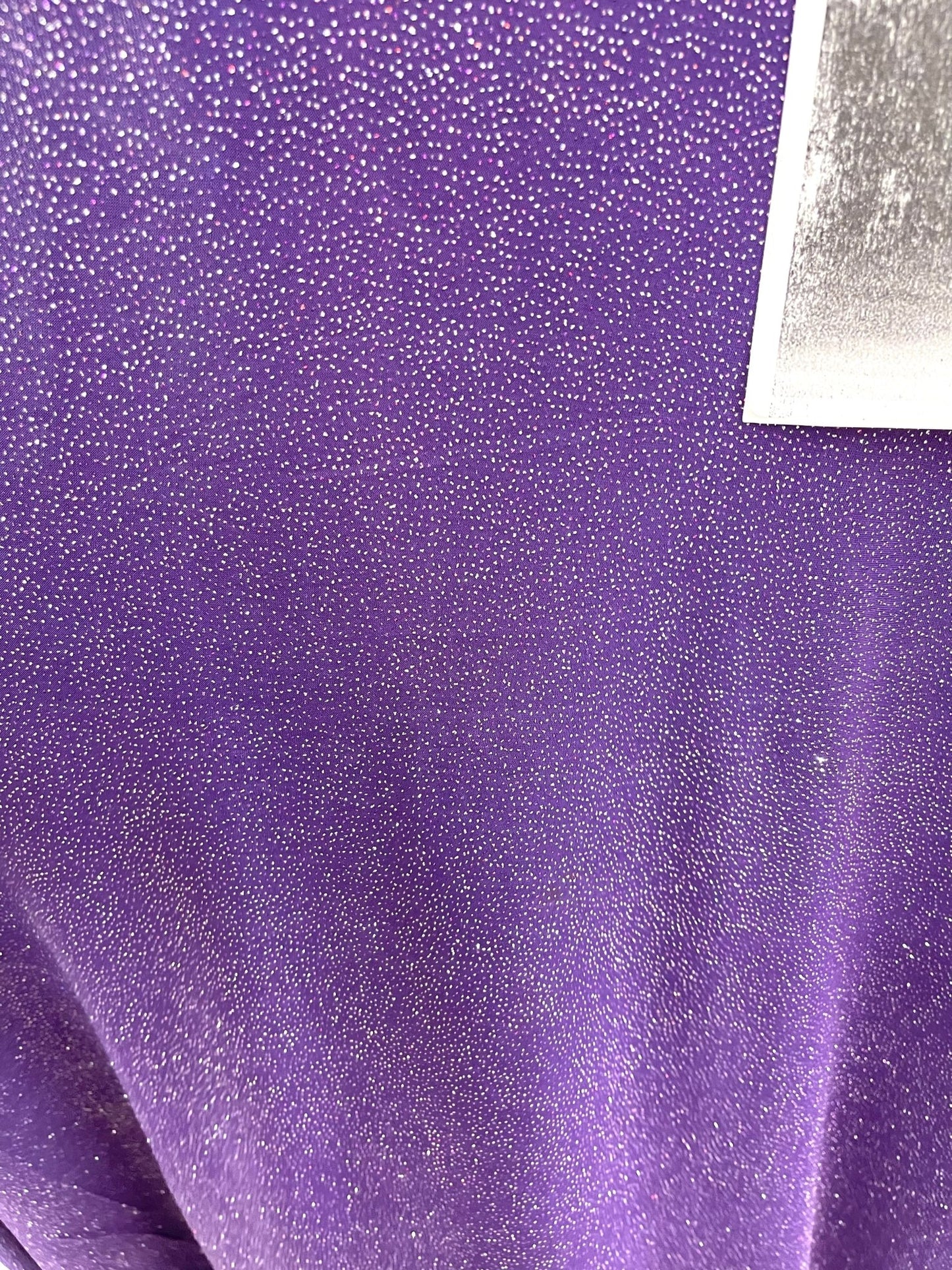 Dark purple shiny iridescent glitter stretch spandex design - Selena fabric - decorations - Halloween - sold by the yard - New Creations Fabric & Foam Inc