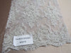 Gorgeous white French design embroider and beaded on a mesh lace. Wedding/Bridal/Prom/Nightgown fabric. - New Creations Fabric & Foam Inc