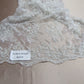Gorgeous white French design embroider and beaded on a mesh lace. Wedding/Bridal/Prom/Nightgown fabric. - New Creations Fabric & Foam Inc