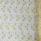 Daisy multi color gold metallic floral design embroider on a red mesh lace-dresses-sold by the yard.