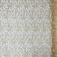 Daisy multi color gold metallic floral design embroider on a red mesh lace-dresses-sold by the yard.