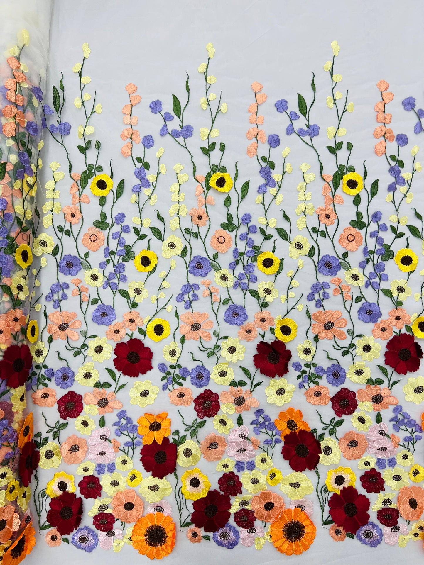 Multi color Sun flower 3d design embroider in a mesh lace-sold by the yard.