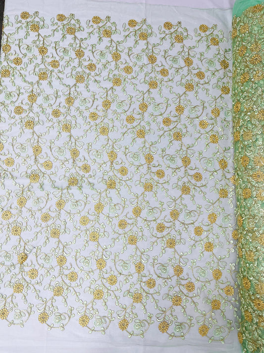 Daisy multi color gold metallic floral design embroider on a red mesh lace-dresses-sold by the yard.