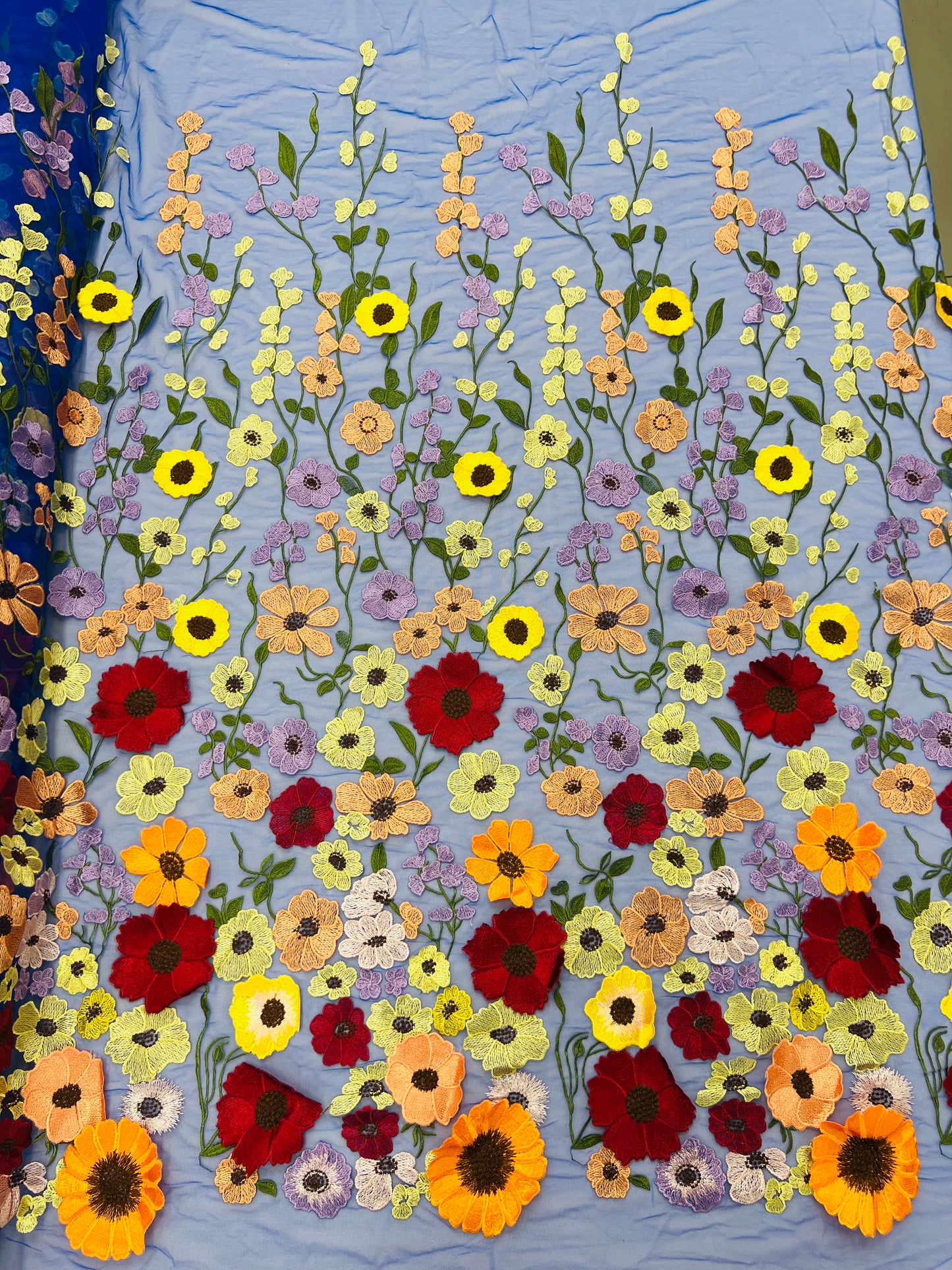 Multi color Sun flower 3d design embroider in a mesh lace-sold by the yard.