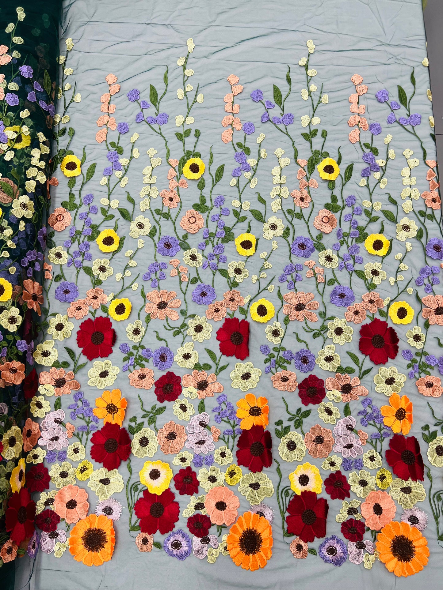 Multi color Sun flower 3d design embroider in a mesh lace-sold by the yard.