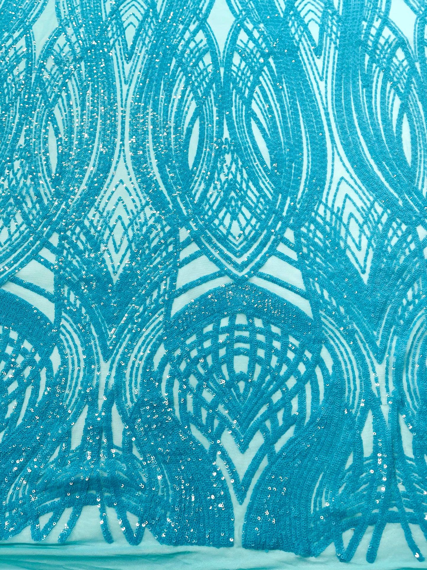 Feather damask shiny sequin design on a 4 way stretch mesh| New Creations Fabric & Foam Inc.