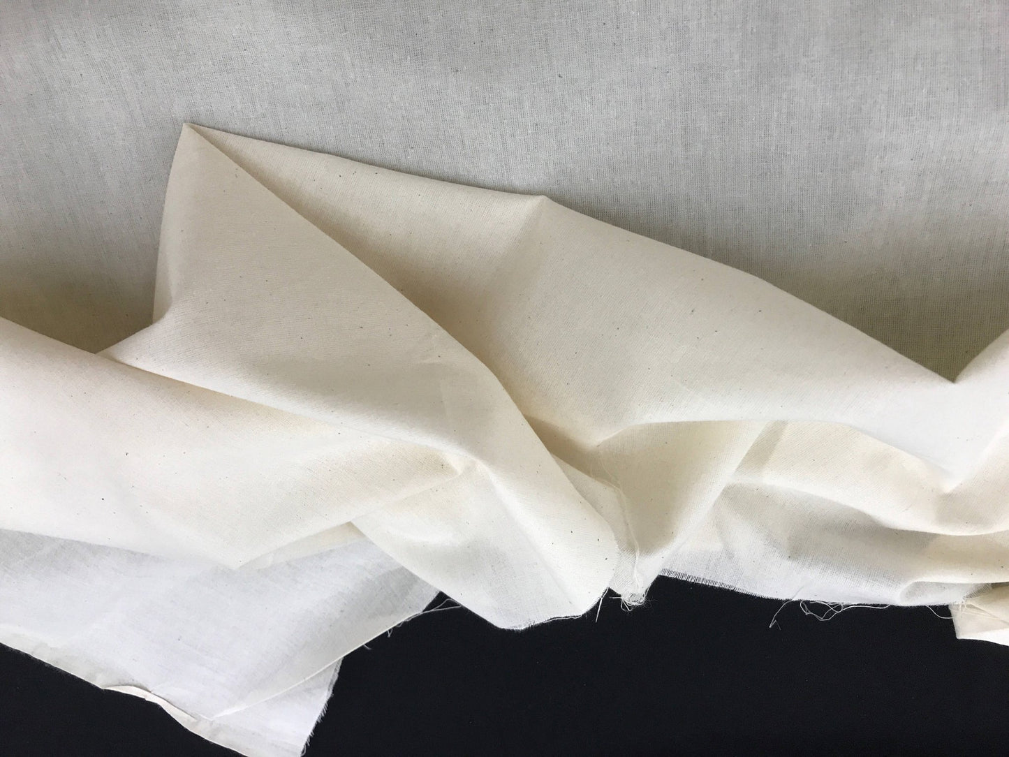 Ivory Muslin natural 100% cotton medium quality unbleached fabric - 45 - 48" wide - pattern maker fabric - sold by the yard. - New Creations Fabric & Foam Inc