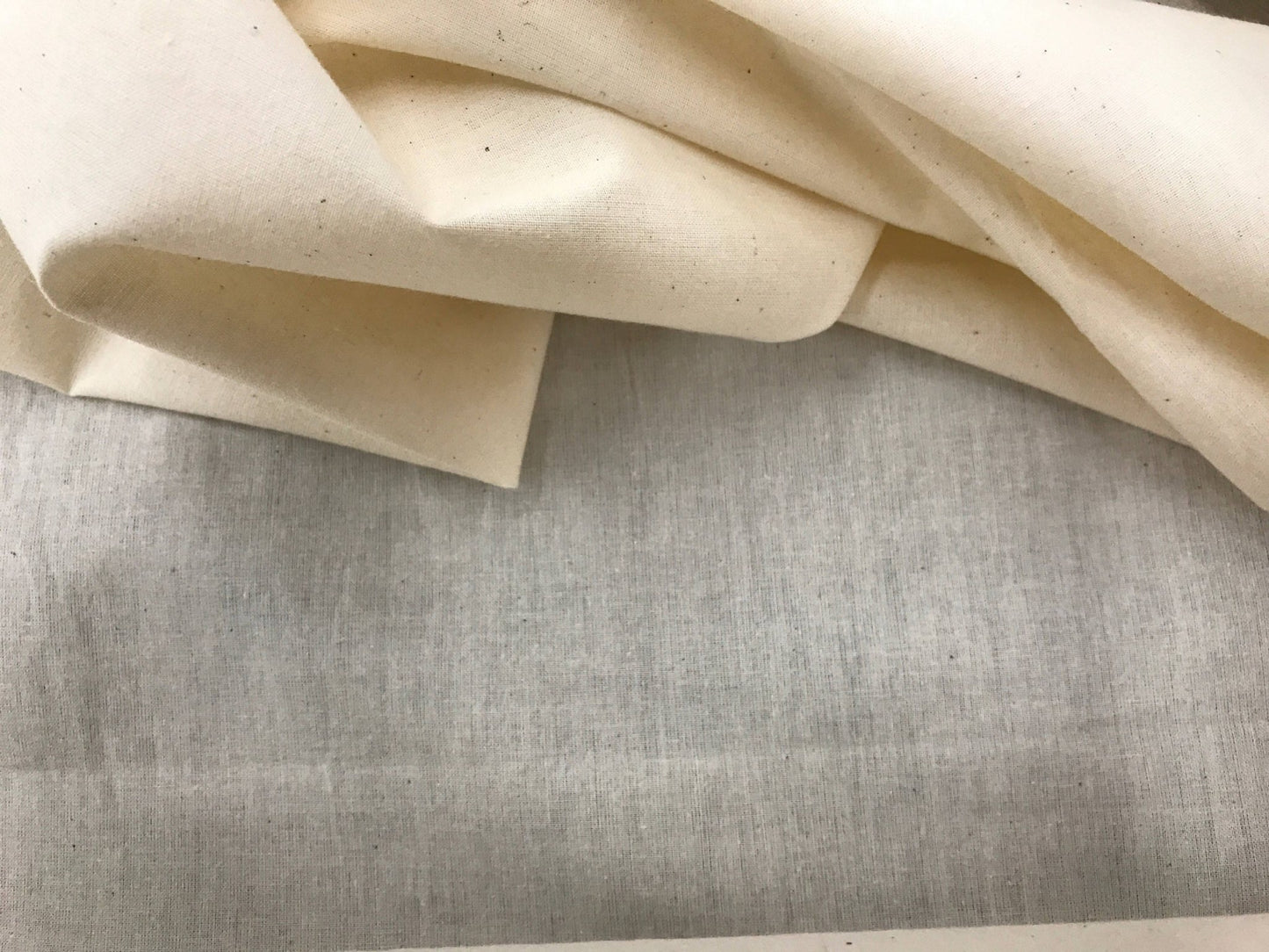 Ivory Muslin natural 100% cotton medium quality unbleached fabric - 45 - 48" wide - pattern maker fabric - sold by the yard. - New Creations Fabric & Foam Inc